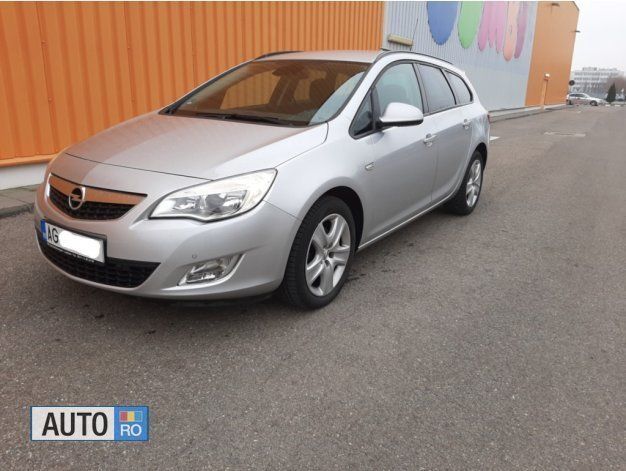 Second-hand Opel Astra 125 CP (91 kW) 2011 Argintiu Berlinǎ