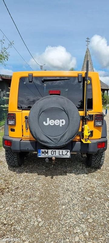 Second-hand Jeep Wrangler 200 CP (147 kW) 2013 Culoareportocaliu SUV