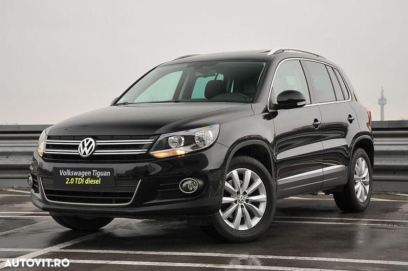Culoarenegru Utilizat 2014 VW Tiguan SUV | 8.650 EUR (Super Preț) - Imagine 1/4