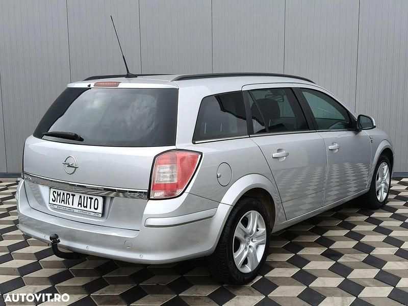 Second-hand Opel Astra Edition 110 CP (80 kW) 2010 Culoareargint Break