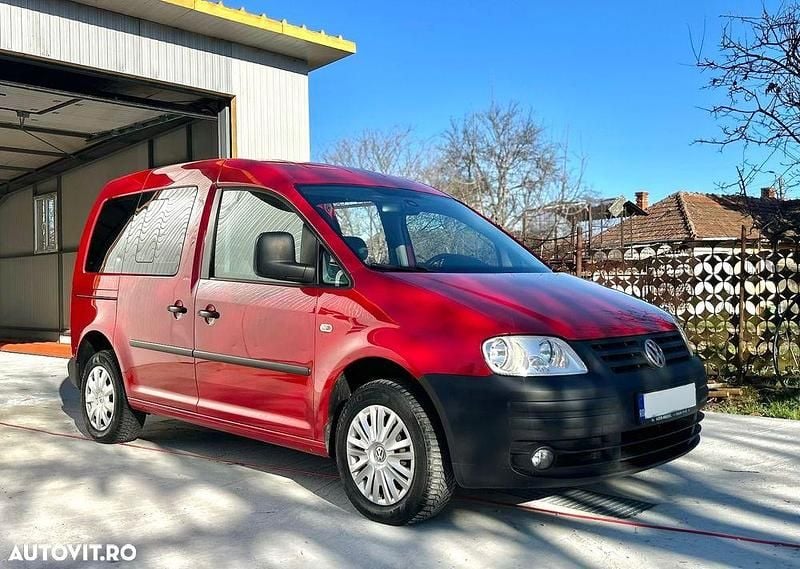 Second-hand VW Caddy 75 CP (55 kW) 2009 Culoarerosu Monovolum