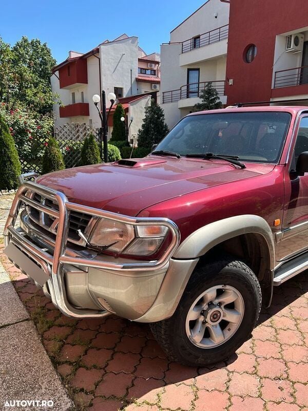 Rosu Utilizat 2001 Nissan Patrol SUV | 11.500 EUR (Preț OK) - Imagine 1/4