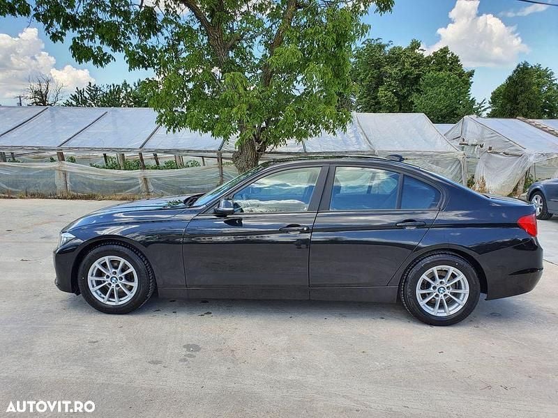 Culoarenegru Utilizat 2014 BMW 320 Efficient Dynamics Berlinǎ | 8.990 EUR (Super Preț) - Imagine 1/4