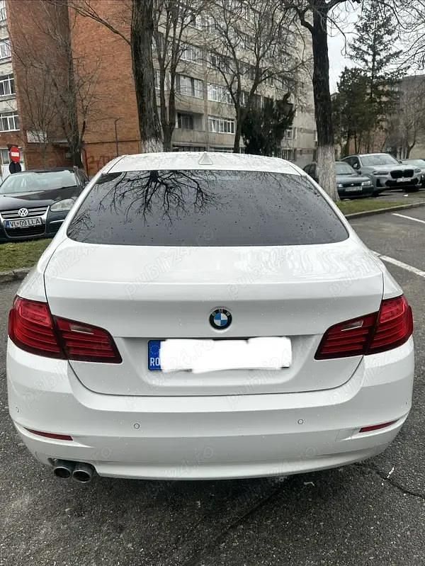 Second-hand BMW 520 190 CP (139 kW) 2014 Alb Berlinǎ