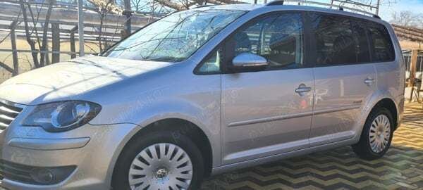 Utilizat 2010 VW Touran Freestyle Monovolum | 5.900 EUR (Preț OK) - Imagine 1/4