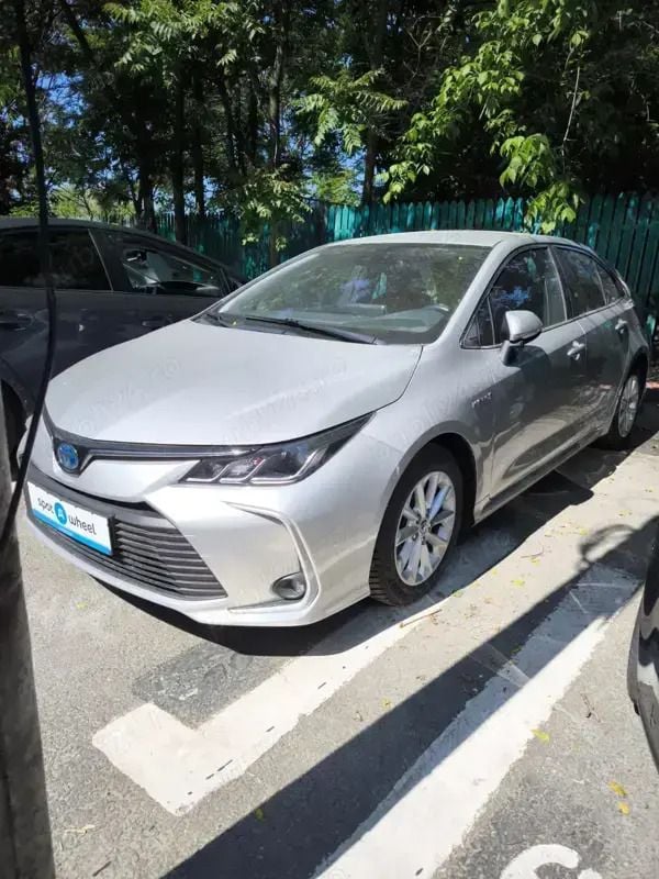 Argintiu Utilizat 2020 Toyota Corolla Hybrid Berlinǎ | 14.950 EUR (Preț OK) - Imagine 1/4