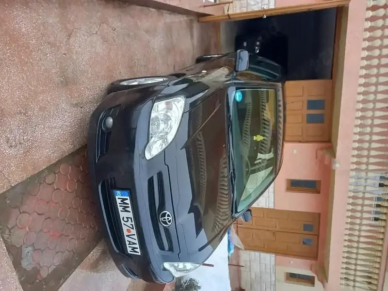 Second-hand Toyota Corolla 90 CP (66 kW) 2006 Negru Break