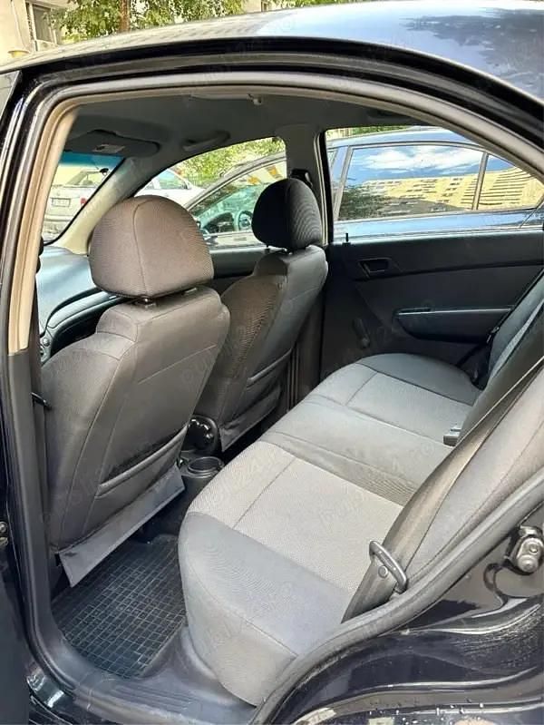 Second-hand Chevrolet Aveo 84 CP (61 kW) 2011 Negru Berlinǎ