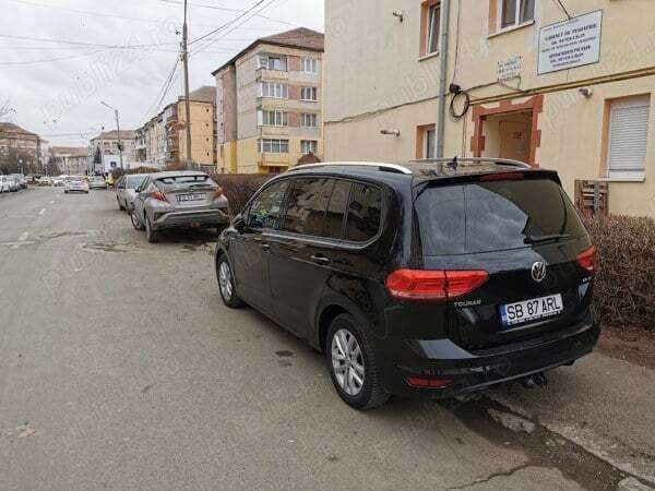 Second-hand VW Touran Comfortline 150 CP (110 kW) 2017 Negru Monovolum