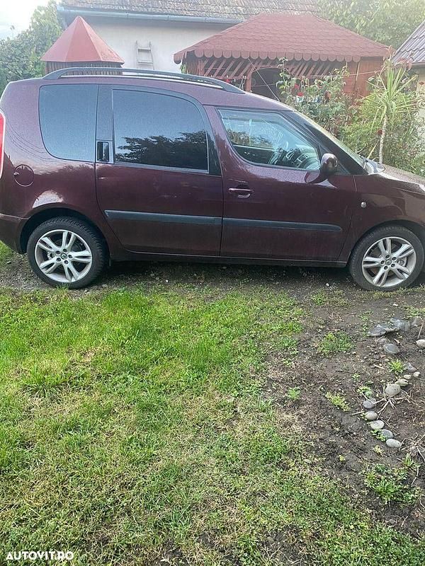 Second-hand Skoda Roomster Style 105 CP (77 kW) 2009 Culoarerosu Monovolum