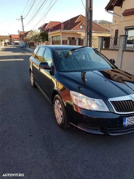 Culoarenegru Utilizat 2012 Skoda Octavia Break | 3.600 EUR (Preț OK) - Imagine 1/4