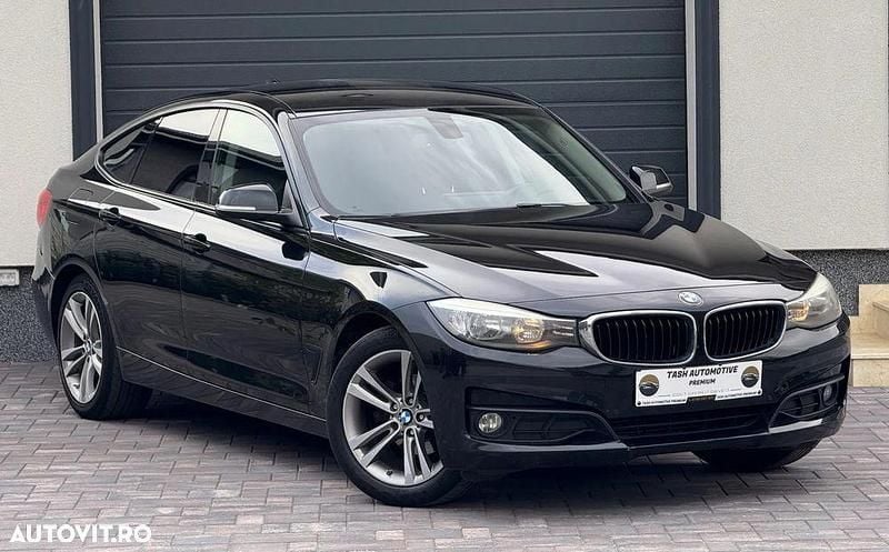 Culoarenegru Utilizat 2014 BMW 318 Gran Turismo Comfort Edition Berlinǎ | 10.199 EUR (Preț bun) - Imagine 1/4