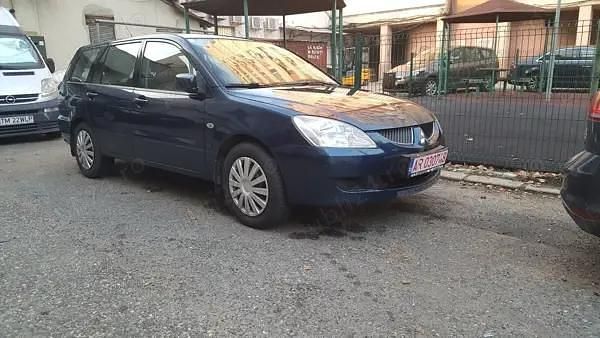 Second-hand Mitsubishi Lancer Invite 98 CP (72 kW) 2005 Negru Berlinǎ