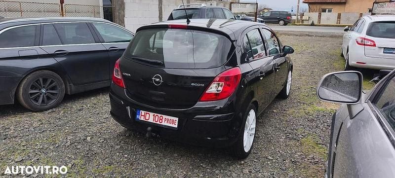 Second-hand Opel Corsa Cosmo 90 CP (66 kW) 2011 Culoarenegru Hatchback