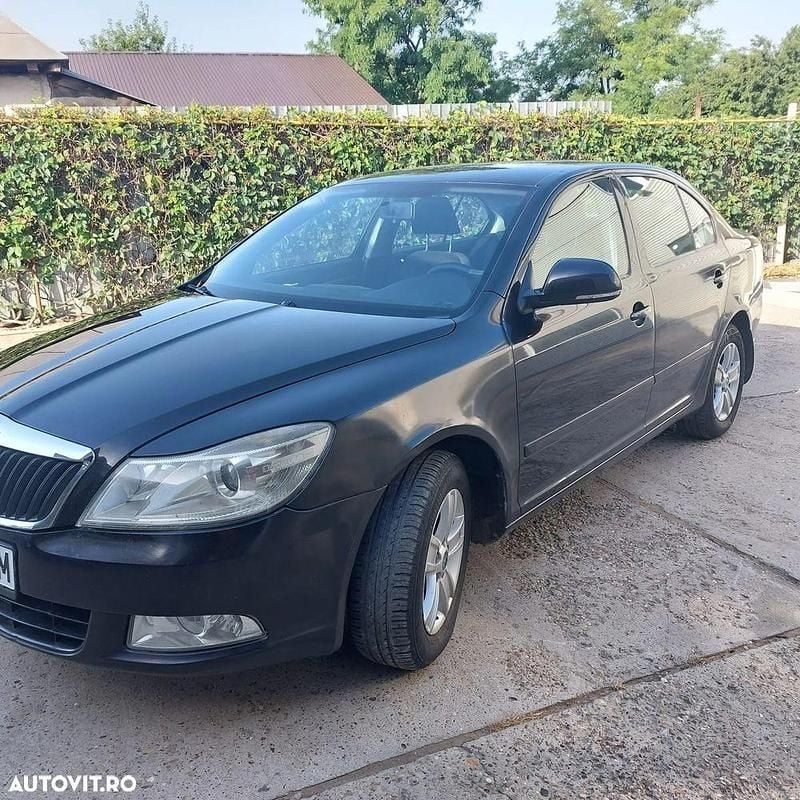 Negru Utilizat 2011 Skoda Octavia Elegance Berlinǎ | 5.350 EUR (Preț OK) - Imagine 1/4
