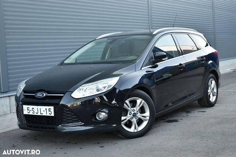 Culoarenegru Utilizat 2013 Ford Focus Titanium Break | 5.590 EUR (Preț OK) - Imagine 1/4