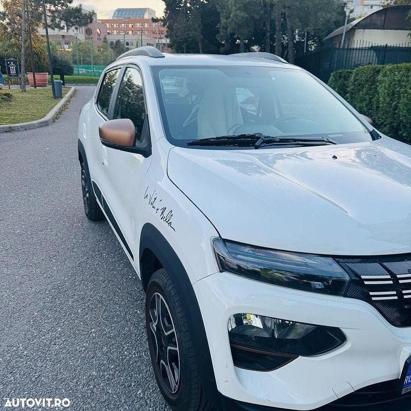 Culoarealb Utilizat 2024 Dacia Spring Hatchback | 13.100 EUR (Preț OK) - Imagine 1/4
