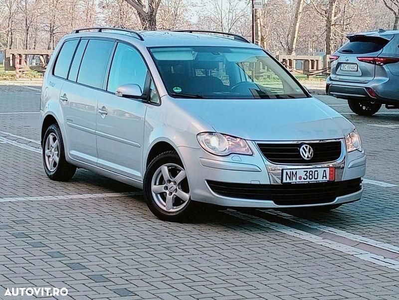 Second-hand VW Touran United 140 CP (102 kW) 2009 Culoaregri Monovolum