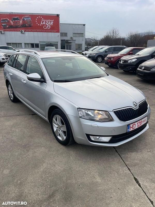 Culoareargint Utilizat 2014 Skoda Octavia Ambiente Break | 5.999 EUR (Preț OK) - Imagine 1/4
