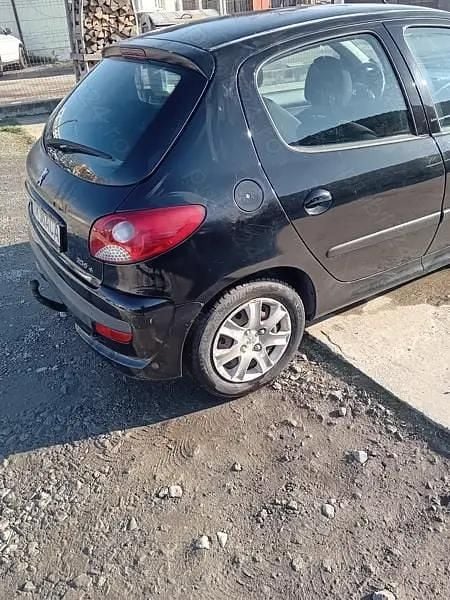 Second-hand Peugeot 206 78 CP (57 kW) 2010 Negru Berlinǎ