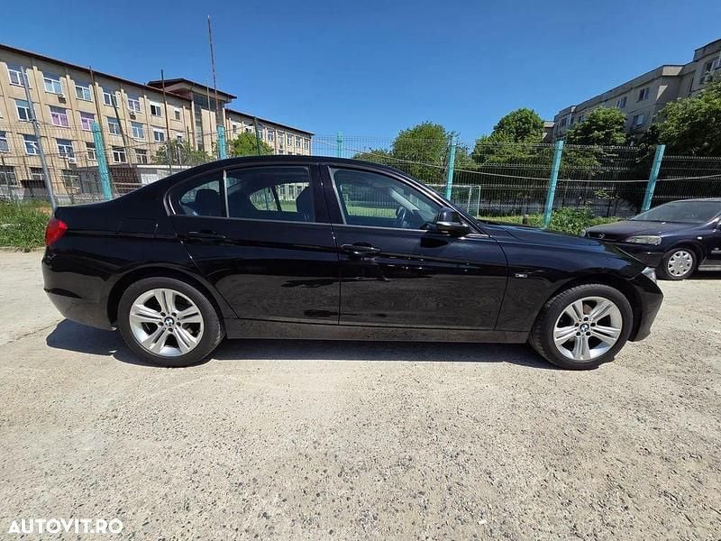 Culoarenegru Utilizat 2012 BMW 320 Sport Line Berlinǎ | 10.500 EUR (Preț OK) - Imagine 1/4