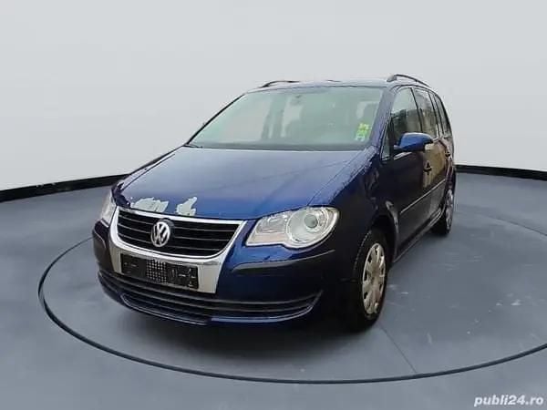 Albastru Utilizat 2009 VW Touran Monovolum | 2.599 EUR (Preț bun) - Imagine 1/4