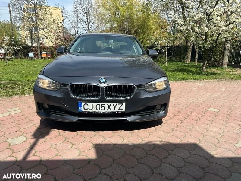 Gri Utilizat 2014 BMW 318 Berlinǎ | 8.500 EUR (Preț bun) - Imagine 1/4