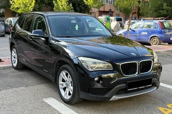Negru Utilizat 2013 BMW X1 SUV | 12.000 EUR (Preț OK) - Imagine 1/4