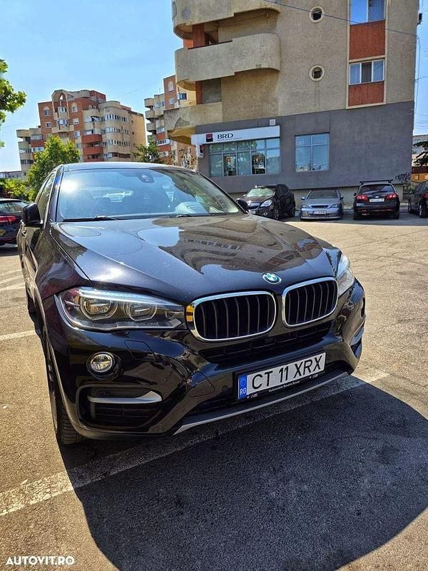 Culoarenegru Utilizat 2014 BMW X6 Comfort Edition SUV | 22.500 EUR (Super Preț) - Imagine 1/4