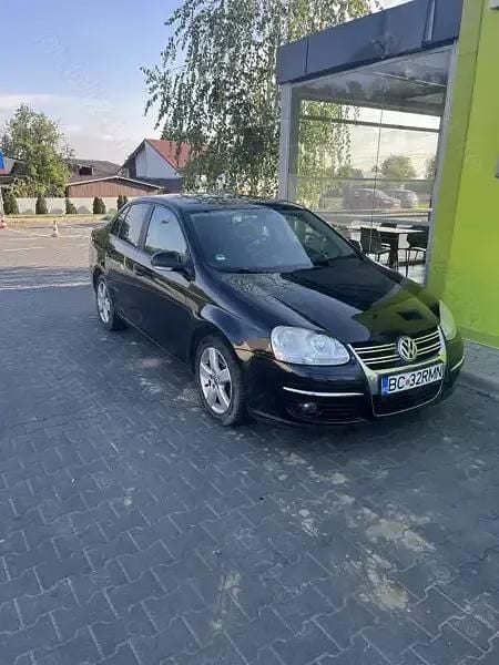 Negru Utilizat 2009 VW Jetta Berlinǎ | 4.350 EUR (Preț OK) - Imagine 1/4