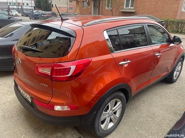 Second-hand Kia Sportage 184 CP (135 kW) 2013 Portocaliu SUV