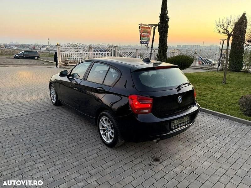 Second-hand BMW 116 136 CP (100 kW) 2013 Culoarenegru Hatchback
