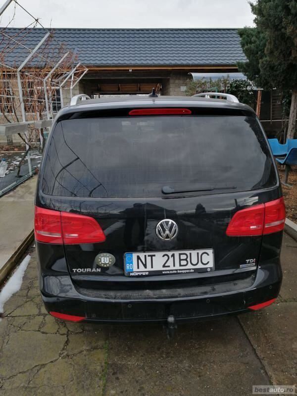 Second-hand VW Touran 104 CP (76 kW) 2014 Negru Monovolum