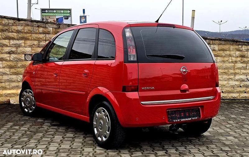Second-hand Opel Meriva 100 CP (73 kW) 2009 Culoarerosu Monovolum