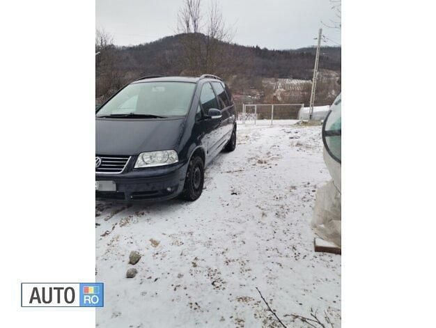 Second-hand VW Sharan 90 CP (66 kW) 2006 Albastru Monovolum