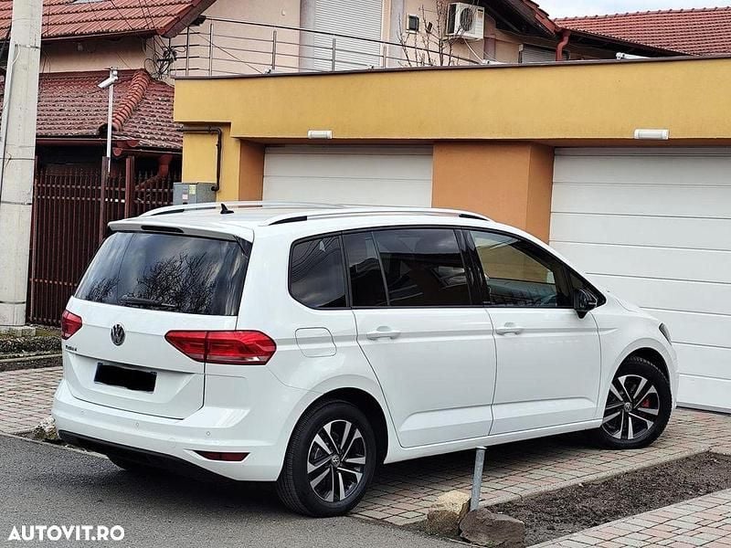 Second-hand VW Touran 150 CP (110 kW) 2020 Culoarealb Monovolum