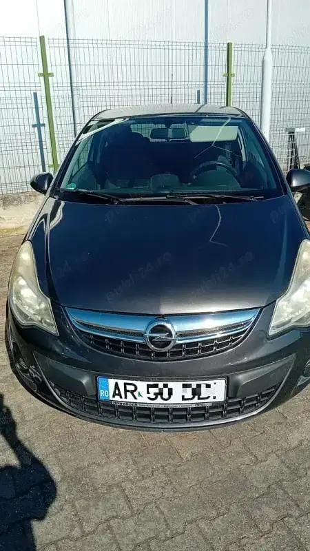 Gri Utilizat 2011 Opel Corsa Satellite Hatchback | 3.799 EUR (Preț OK) - Imagine 1/4