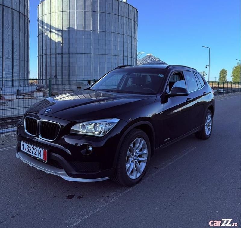 Negru Utilizat 2014 BMW X1 SUV | 9.599 EUR (Super Preț) - Imagine 1/4