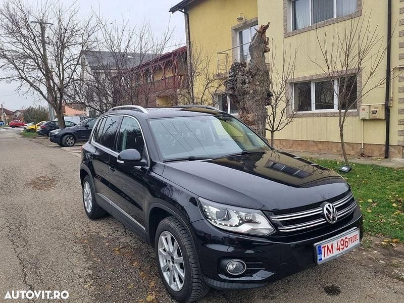 Culoarenegru Utilizat 2013 VW Tiguan Exclusive SUV | 9.950 EUR (Preț bun) - Imagine 1/4