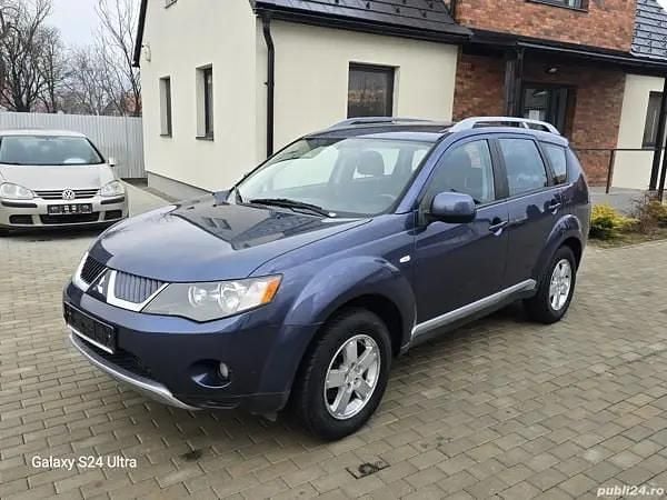 Gri Utilizat 2007 Mitsubishi Outlander Intense SUV | 4.950 EUR (Scump) - Imagine 1/4