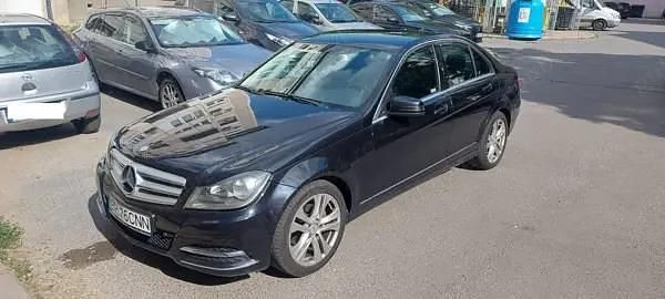 Negru Utilizat 2012 Mercedes C180 Berlinǎ | 7.800 EUR (Preț bun) - Imagine 1/4