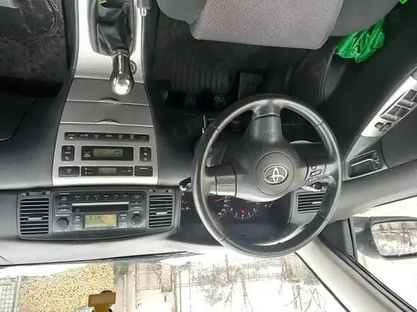 Second-hand Toyota Corolla 90 CP (66 kW) 2006 Negru Break