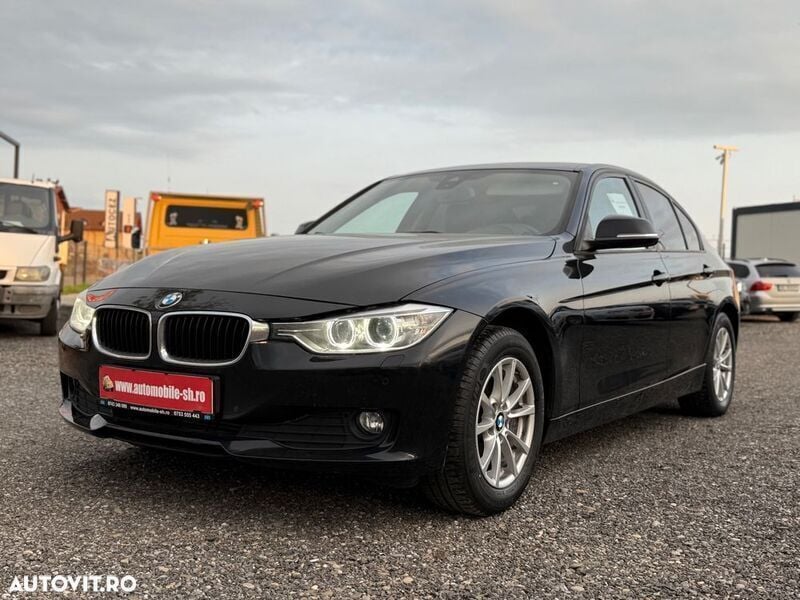 Negru Utilizat 2014 BMW 320 Sport Line Berlinǎ | 9.990 EUR (Super Preț) - Imagine 1/4