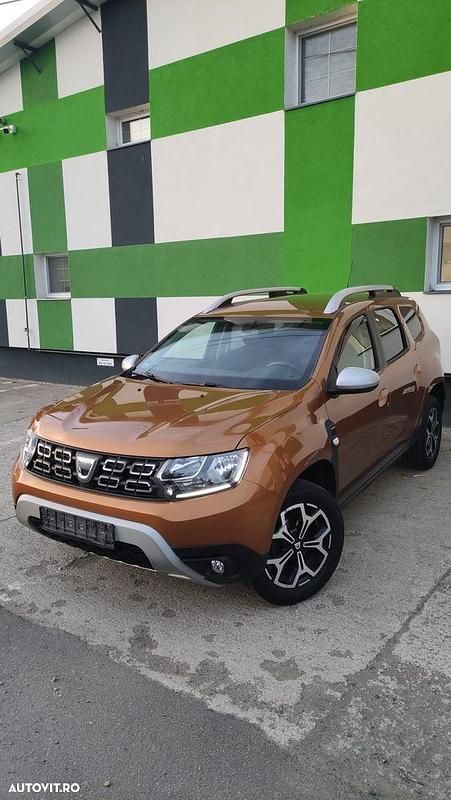 Culoareportocaliu Utilizat 2019 Dacia Duster Prestige SUV | 13.499 EUR (Preț OK) - Imagine 1/4