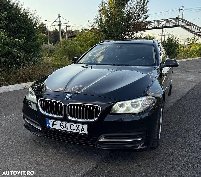 Culoarenegru Utilizat 2015 BMW 520 Comfort Edition Berlinǎ | 12.800 EUR (Super Preț) - Imagine 1/4