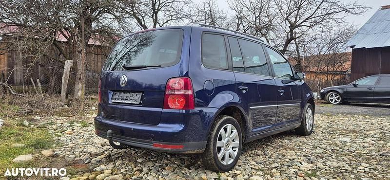 Second-hand VW Touran Highline 140 CP (102 kW) 2008 Culoarealbastru Monovolum