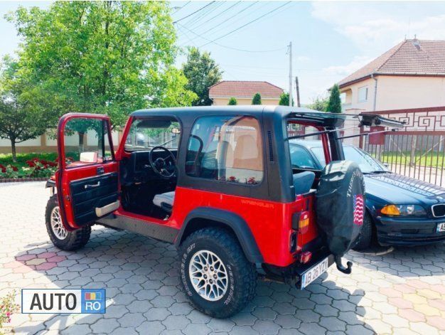 Second-hand Jeep Wrangler 130 CP (95 kW) 1993 Rosu SUV