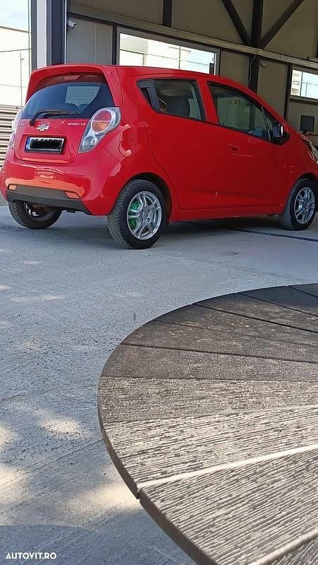Culoarerosu Utilizat 2010 Chevrolet Spark LS Hatchback | 2.100 EUR (Preț bun) - Imagine 1/4