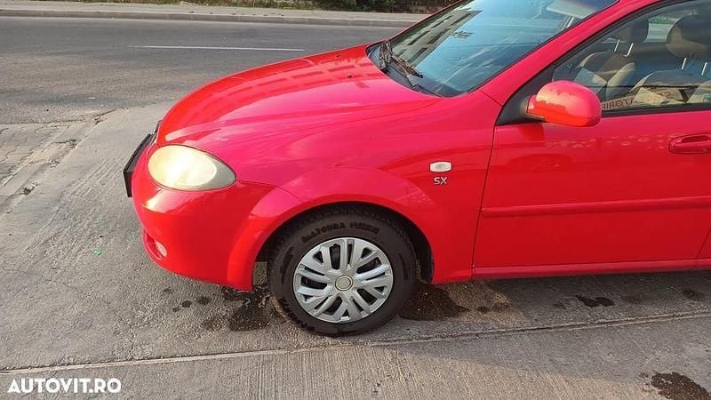 Culoarerosu Utilizat 2005 Chevrolet Lacetti SX Hatchback | 1.000 EUR - Imagine 1/4