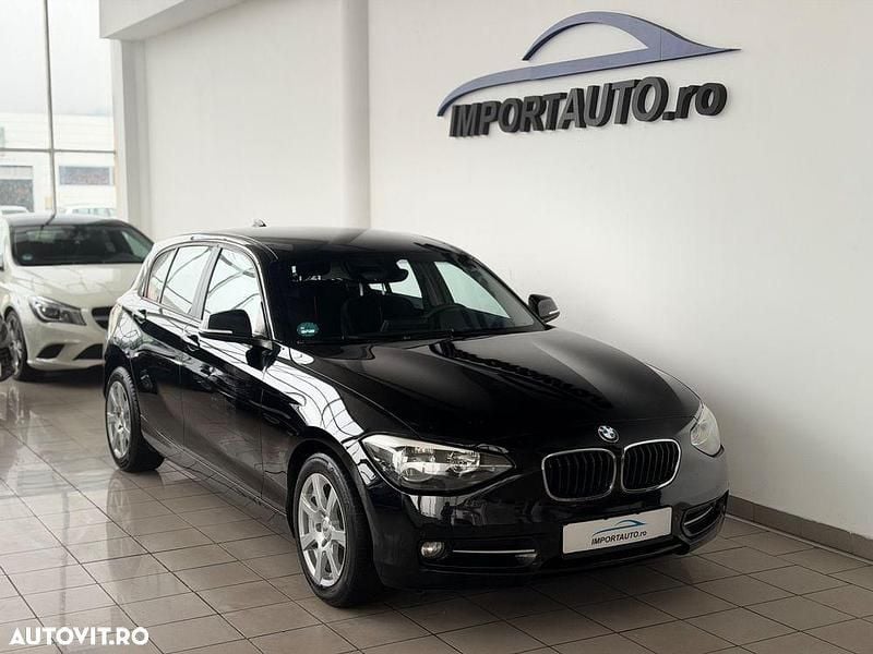 Culoarenegru Utilizat 2012 BMW 118 Sport Line Hatchback | 6.590 EUR (Preț OK) - Imagine 1/4